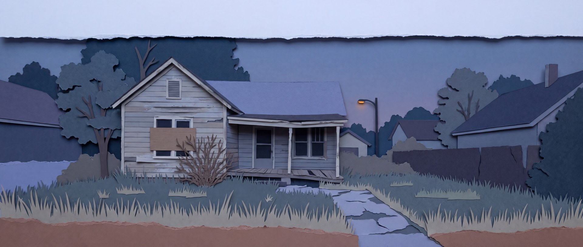 A tired empty house with a boarded window and an overgrown yard at dusk.
